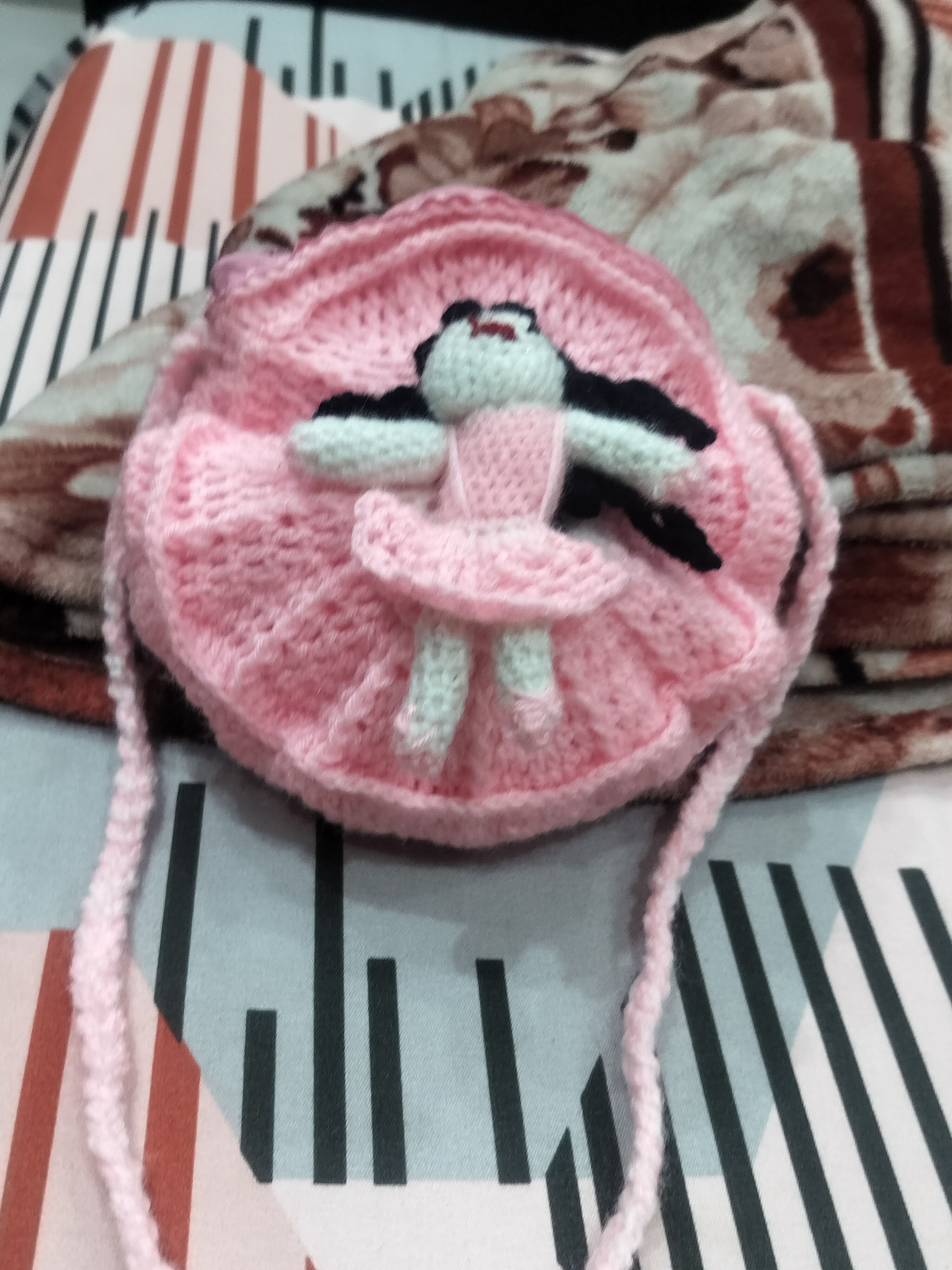 Woolen purse with doll